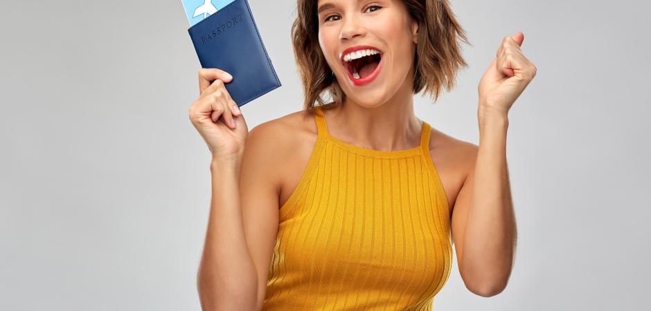 Woman holding airline ticket