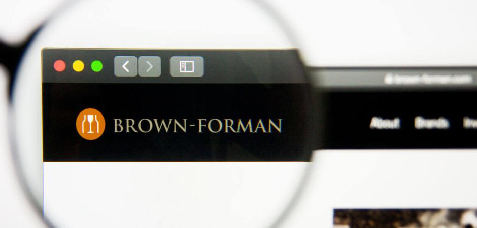 Magnifying glass over brown-forman webpage